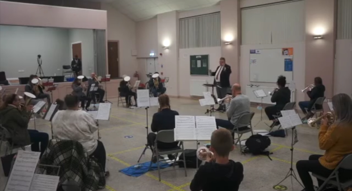 A socially distanced band rehearsal